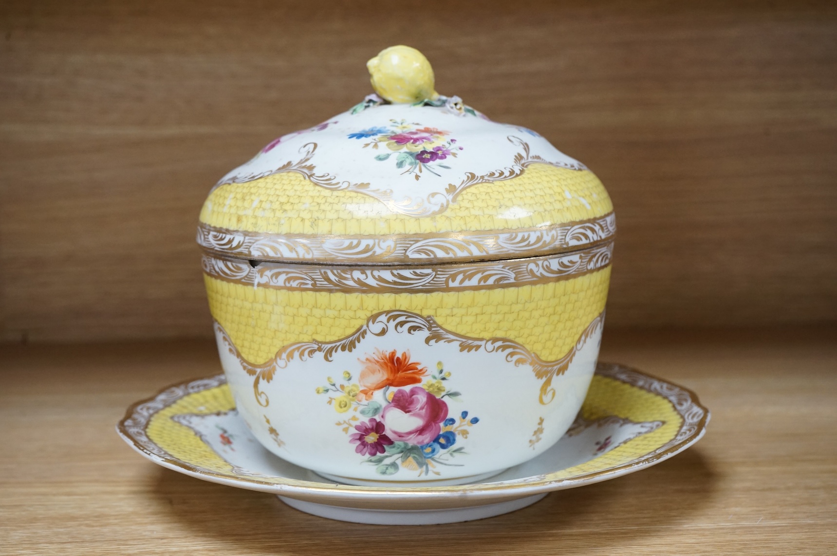 A late 18th century Vienna porcelain ecuelle, cover and stand, hand painted with flowers, 24cm in diameter